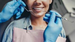 woman in dentist's chair cosmetic bonding